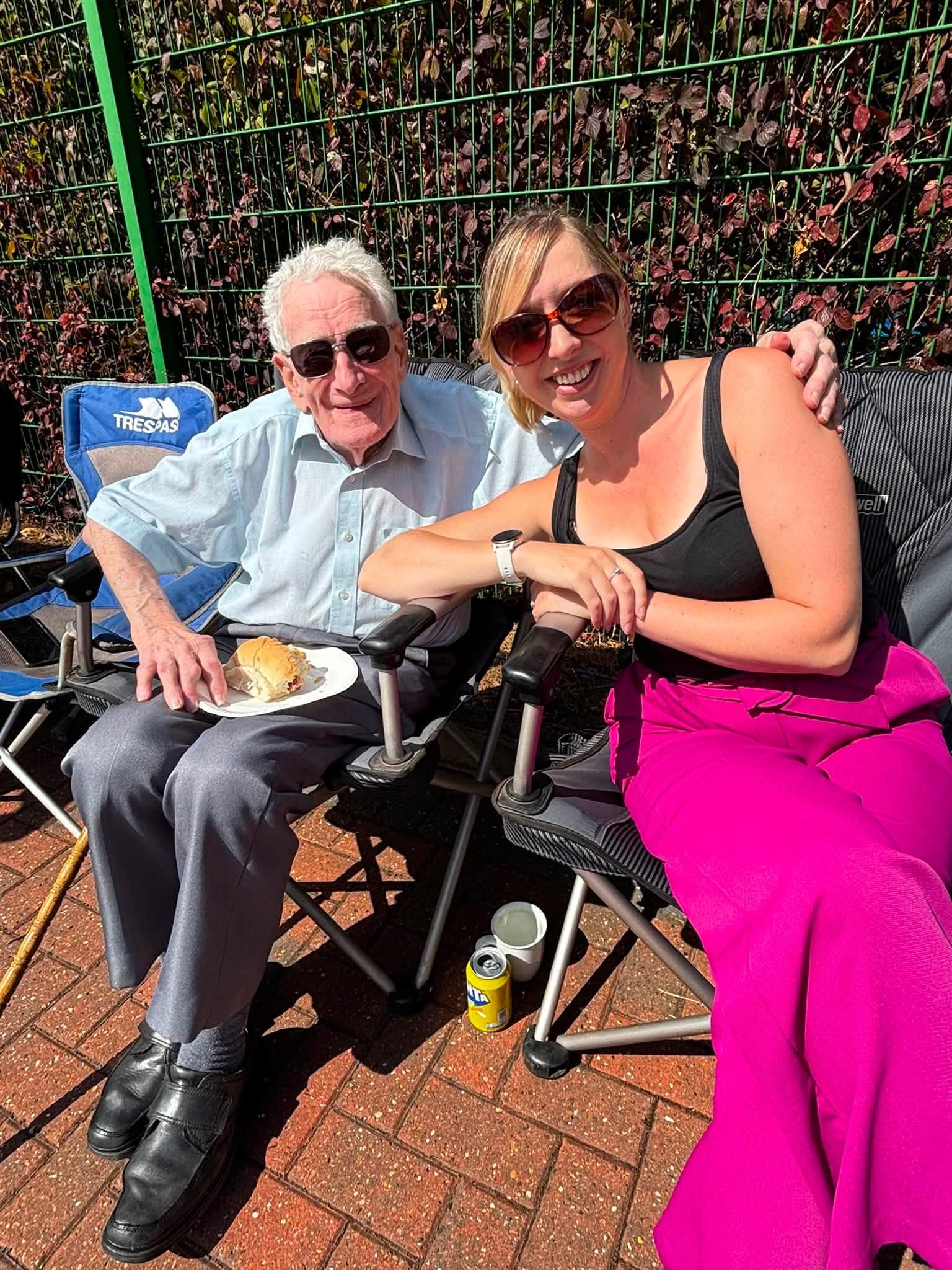 A Your Home Care team member and client enjoying the annual BBQ